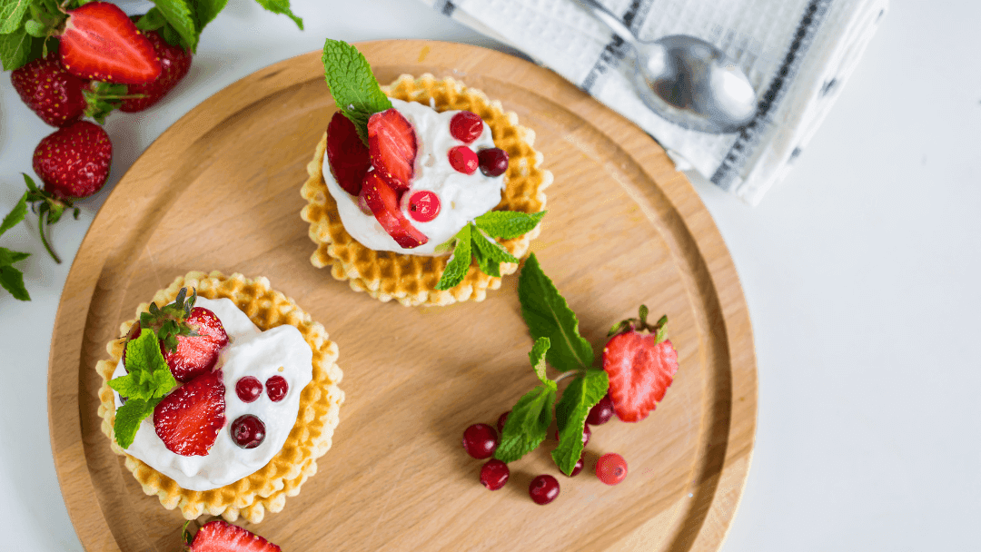 Waffles with whipped cream and strawberry
